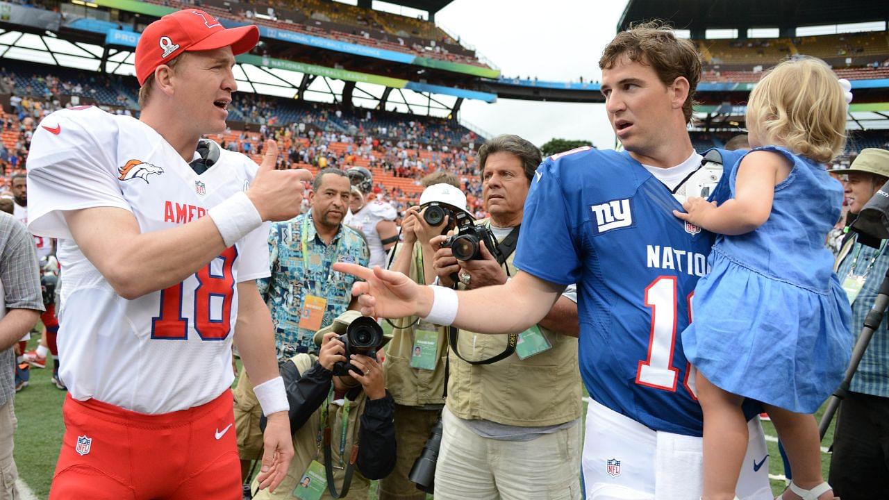 AFC quarterback Peyton Manning of the Denver Broncos (18, left) shakes hands with NFC quarterback Eli Manning of the New York Giants (10, right) after the 2013 Pro Bowl at Aloha Stadium. The NFC defeated the AFC 62-35.