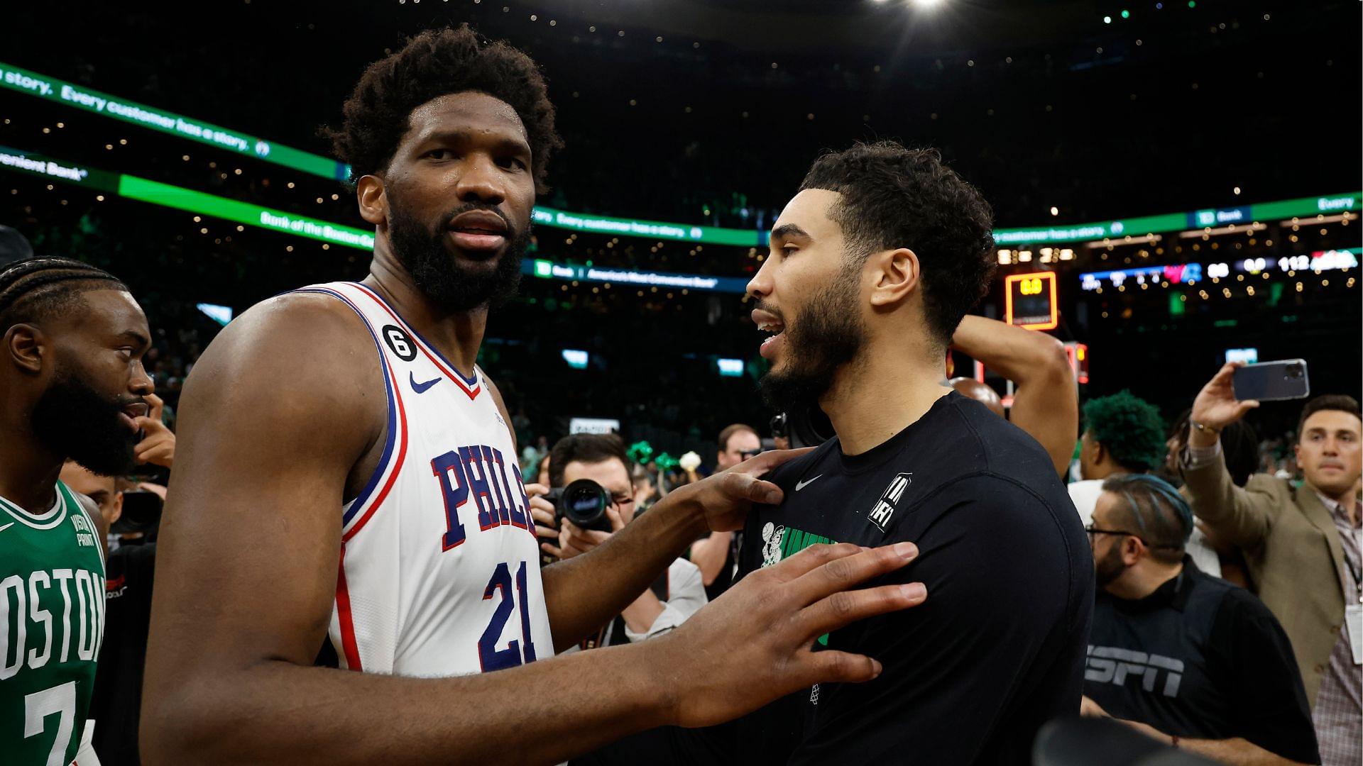 May 14, 2023; Boston, Massachusetts, USA; Boston Celtics forward Jayson Tatum (0) (right) talks with Philadelphia 76ers center Joel Embiid (21) after game seven of the 2023 NBA playoffs at TD Garden
