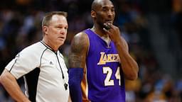 Mar 2, 2016; Denver, CO, USA; Los Angeles Lakers forward Kobe Bryant (24) talks with referee Bill Spooner (22) in the first quarter of the game against the Denver Nuggets at the Pepsi Center.