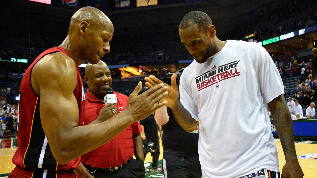 Miami Heat forward LeBron James (right) celebrates with guard Ray Allen after beating the Milwaukee Bucks 88-77