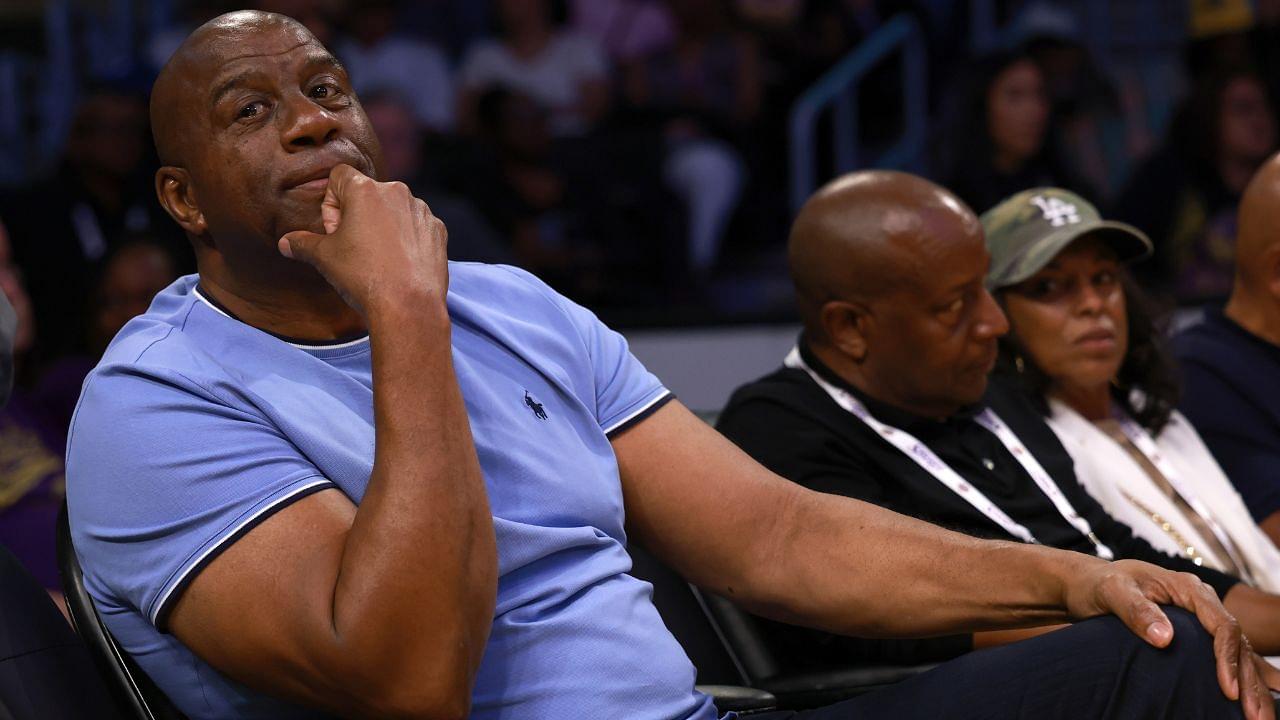 Magic Johnson attends a WNBA game between the Los Angeles Sparks and the Minnesota Lynx at Crypto.com Arena.