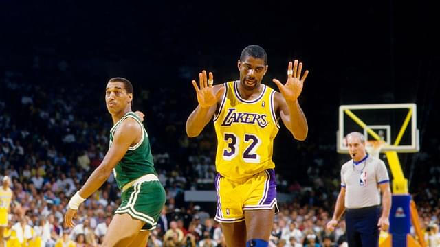 Unknown date; Los Angeles, CA, USA; FILE PHOTO; Los Angeles Lakers guard Magic Johnson (32) reacts as Boston Celtics guard Dennis Johnson points at The Forum. Mandatory