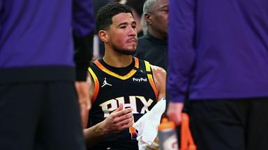 Phoenix Suns guard Devin Booker (1) reacts on the bench against the Oklahoma City Thunder during the second half at Footprint Center.