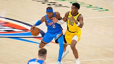 Oklahoma City Thunder guard Shai Gilgeous-Alexander (2) dribbles the ball against Indiana Pacers guard Bennedict Mathurin (00) during the second half during game two of the 2025 NBA Finals at Paycom Center.