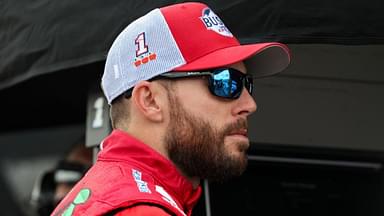 NASCAR Cup Series driver Ross Chastain looks on from behind the pit wall during practice and qualifying for The Great American Getaway 400 at Pocono Raceway.