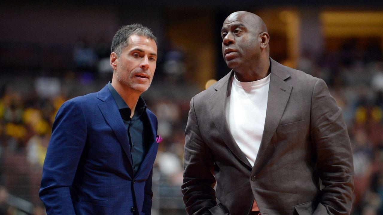 Los Angeles Lakers general manager Rob Pelinka speaks with president of basketball operations Magic Johnson at Honda Center.