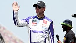 NASCAR Cup Series driver Denny Hamlin (11) greets the crowd during driver introductions before the start of the FireKeepers Casino 400 at Michigan International Speedway.
