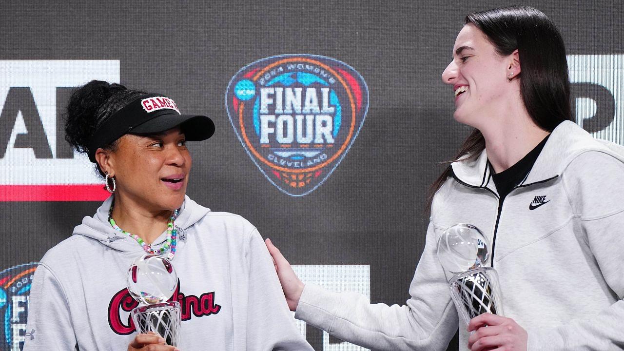 Apr 4, 2024; Cleveland, OH, USA; South Carolina Gamecocks coach Dawn Staley (left) and Iowa Hawkeyes guard Caitlin Clark pose react after being selected as the AP Coach and Player of the Year at a press conference at Rocket Mortgage FieldHouse. Mandatory Credit: Kirby Lee-Imagn Images