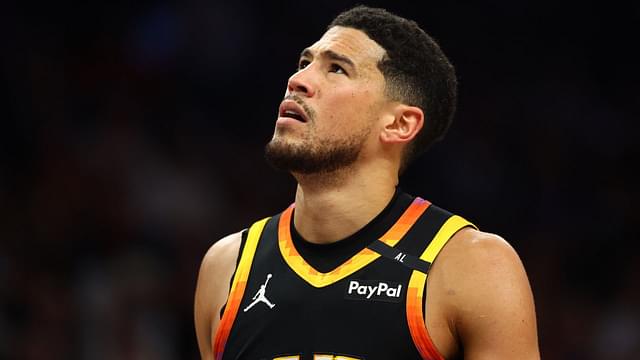 Apr 9, 2025; Phoenix, Arizona, USA; Phoenix Suns guard Devin Booker (1) reacts after a play against the Oklahoma City Thunder during the first half at Footprint Center.