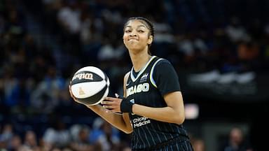 Jun 17, 2025; Chicago, Illinois, USA; Chicago Sky forward Angel Reese (5) looks to pass the ball against the Washington Mystics during the first half of a WNBA game at Wintrust Arena. Mandatory Credit: Kamil Krzaczynski-Imagn Images
