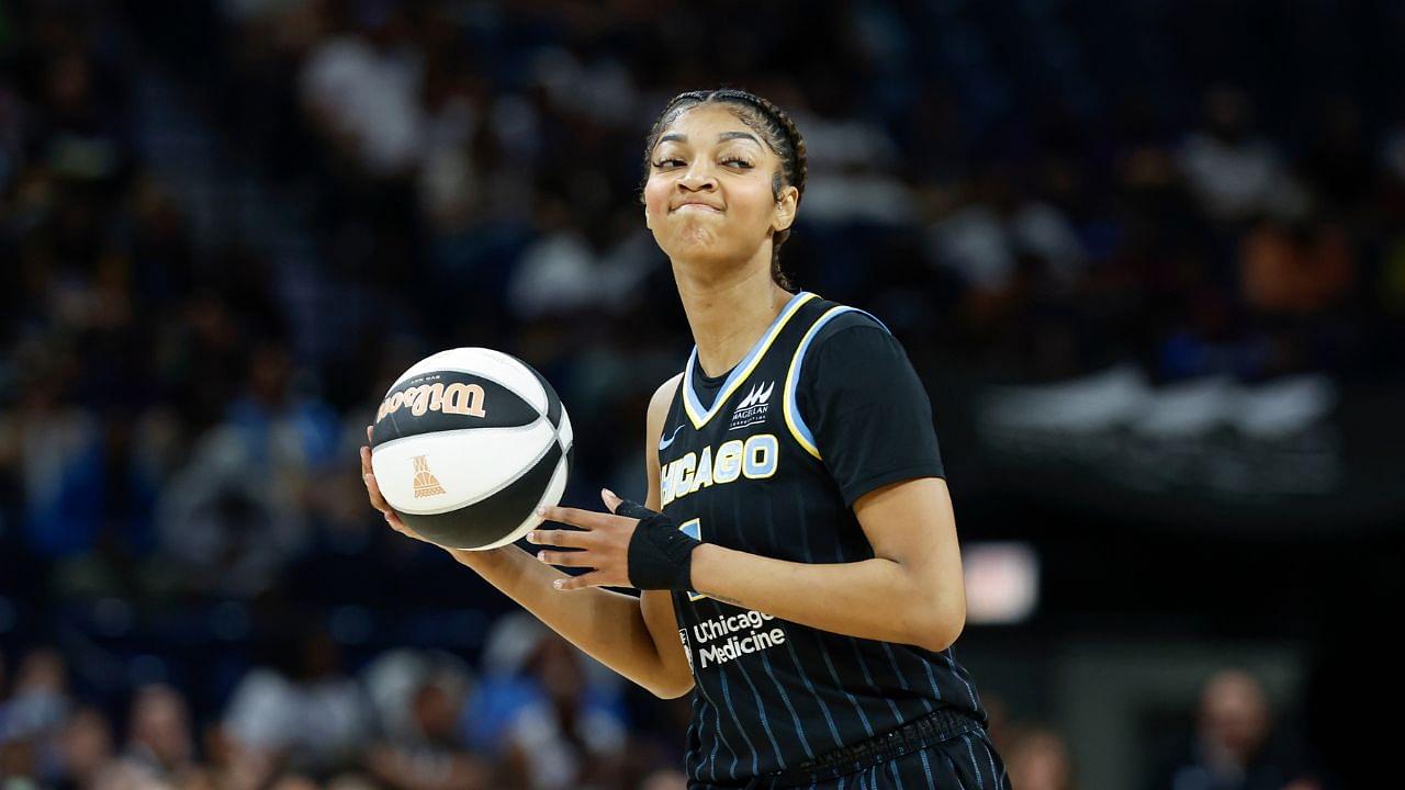 Jun 17, 2025; Chicago, Illinois, USA; Chicago Sky forward Angel Reese (5) looks to pass the ball against the Washington Mystics during the first half of a WNBA game at Wintrust Arena. Mandatory Credit: Kamil Krzaczynski-Imagn Images