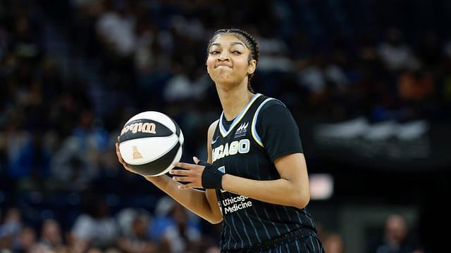 Jun 17, 2025; Chicago, Illinois, USA; Chicago Sky forward Angel Reese (5) looks to pass the ball against the Washington Mystics during the first half of a WNBA game at Wintrust Arena. Mandatory Credit: Kamil Krzaczynski-Imagn Images