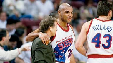 Philadelphia 76ers forward Charles Barkley (32) hugs coach Jim Lynam (left) against the Chicago Bulls at the Spectrum.