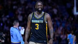 Former Marquette Golden Eagles player Dwyane Wade smiles timeout during the first half of the game against the Providence Friars at Fiserv Forum.