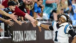 Carolina Panthers quarterback Cam Newton (1) celebrates with fans after defeating the Arizona Cardinals at State Farm Stadium.