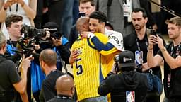 Reggie Miller hugs Indiana Pacers guard Tyrese Haliburton (0) after winning game six of the 2025 NBA Finals between the Oklahoma City Thunder and the Indiana Pacers at Gainbridge Fieldhouse.