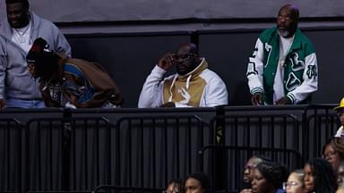 Former NBA player Shaquille O'Neal sits courtside during the first half between the Florida Gators and the LSU Tigers at Exactech Arena at the Stephen C. O'Connell Center