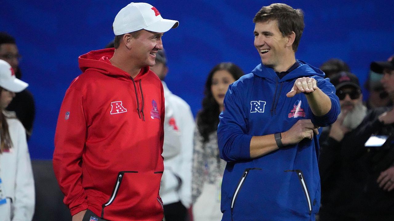 Peyton Manning (left) and Eli Manning react during the Pro Bowl Skills competition at the Intermountain Healthcare Performance Facility.