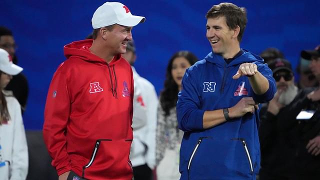 Peyton Manning (left) and Eli Manning react during the Pro Bowl Skills competition at the Intermountain Healthcare Performance Facility.