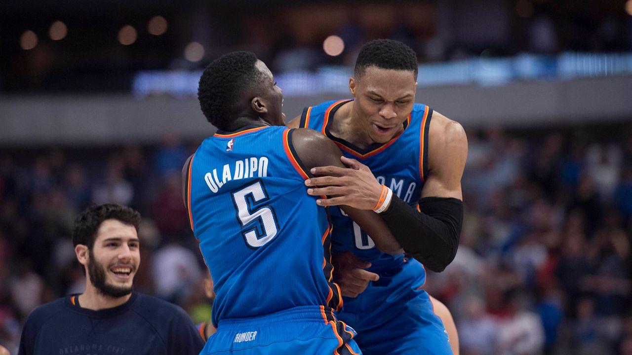 Oklahoma City Thunder guard Russell Westbrook (0) and guard Victor Oladipo (5) celebrate the win over the Dallas Mavericks at the American Airlines Center. The Thunder defeat the Mavericks 92-91.