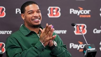 Cincinnati Bengals receiver Ja’marr Chase smiles as he takes questions during a press conference to announce the signing of new contracts for receivers Ja’Marr Chase and Tee Higgins at Paycor Stadium in downtown Cincinnati on Tuesday, March 18, 2025. Chase becomes the new highest-paid non-quarterback player in the NFL.