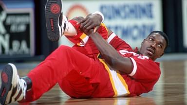 Apr 8, 1990; Orlando, FL, USA; FILE PHOTO; Houston Rockets center #34 HAKEEM OLAJUWON stretches before his game against the Orlando Magic at the Orlando Arena.