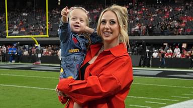 Brittany Mahomes, the wife of Kansas City Chiefs quarterback Patrick Mahomes (15) holds daughter Sterling Mahomes during the game against the Las Vegas Raiders at Allegiant Stadium.