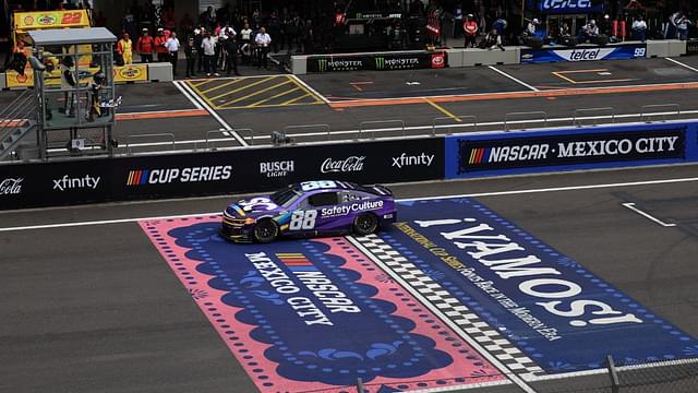 Trackhouse Racing driver Shane van Gisbergen crosses the finish line to win the NASCAR Cup Series Mexico City Race at Autodromo Hermanos Rodriguez.