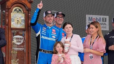 NASCAR Cup Series driver Denny Hamlin (11) and his family celebrate his win at the Cook Out 400 at Martinsville Speedway.