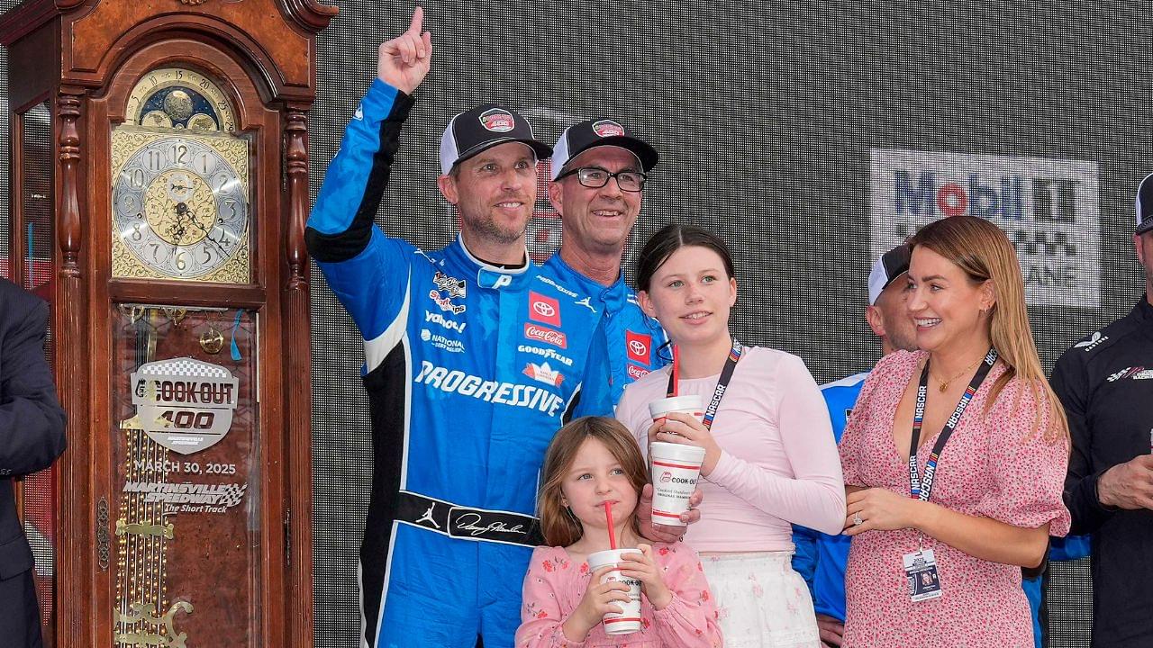 NASCAR Cup Series driver Denny Hamlin (11) and his family celebrate his win at the Cook Out 400 at Martinsville Speedway.