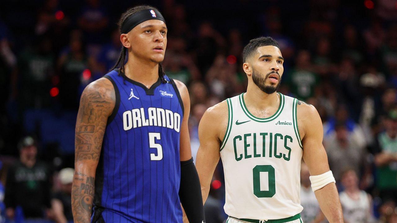 Apr 27, 2025; Orlando, Florida, USA; Orlando Magic forward Paolo Banchero (5) and Boston Celtics forward Jayson Tatum (0) wait fro a break in play in the fourth quarter during game four of first round for the 2025 NBA Playoffs at Kia Center. Mandatory Credit: Nathan Ray Seebeck-Imagn Images