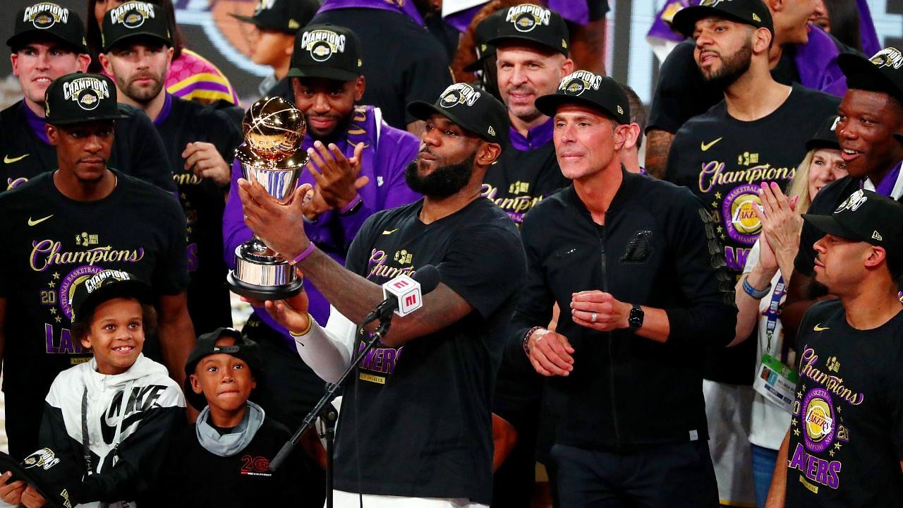 Los Angeles Lakers forward LeBron James (23) holds up the MVP trophy after game six of the 2020 NBA Finals at AdventHealth Arena. The Los Angeles Lakers won 106-93 to win the series.