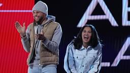 Golden State Warriors players Stephen Curry and wife Ayesha Curry react on stage during the 2022 NBA All-Star Saturday Night at Rocket Mortgage Field House.
