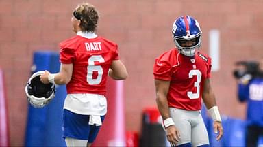 New York Giants quarterback Jaxson Dart (6) and quarterback Russell Wilson (3) interact during minicamp at Quest Diagnostics Training Center.