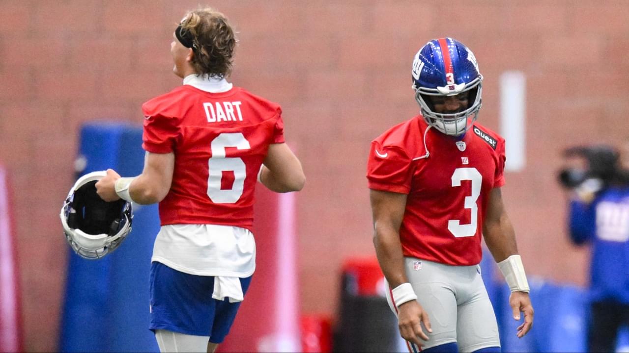 New York Giants quarterback Jaxson Dart (6) and quarterback Russell Wilson (3) interact during minicamp at Quest Diagnostics Training Center.