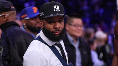 NFL wide receiver Odell Beckham Jr. sits courtside during the second half of the NBA game between the New York Knicks and the Phoenix Suns at Madison Square Garden.