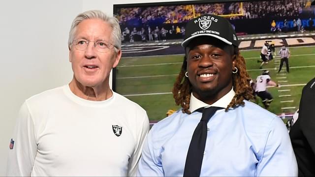 Las Vegas Raiders head coach Pete Carroll, Ashton Jeanty and general manager John Spytek pose after a news conference introducing Jeanty as the first round draft pick in the 2025 NFL Draft at Intermountain Health Performance Center.