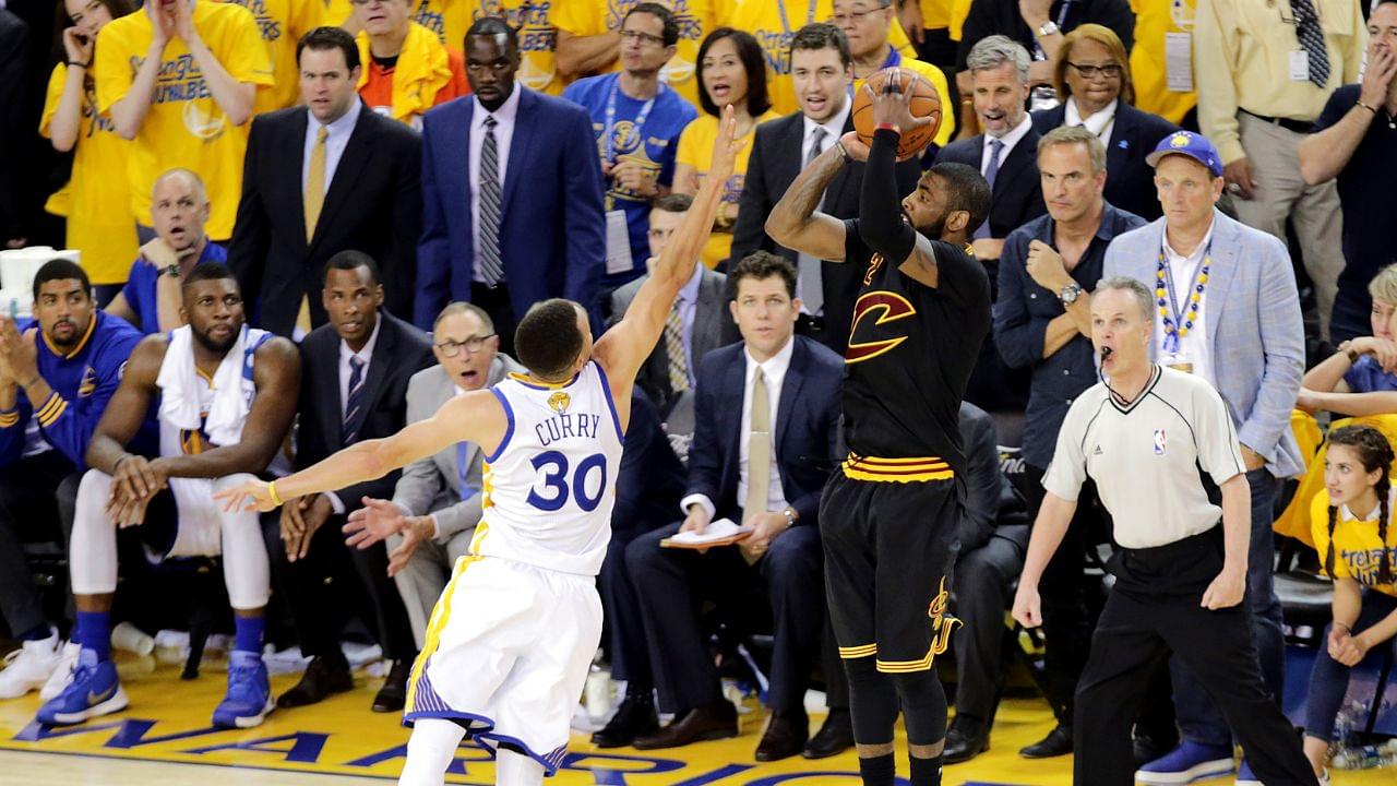 Cleveland Cavaliers guard Kyrie Irving (2) shoots the the game winning shot during the fourth quarter against Golden State Warriors guard Stephen Curry (30) in game seven of the NBA Finals at Oracle Arena.