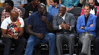 NBA Hall of Famers Shaquille O'Neal and Magic Johnson share a laugh during the second half between the Los Angeles Lakers and the Golden State Warriors at T-Mobile Arena.