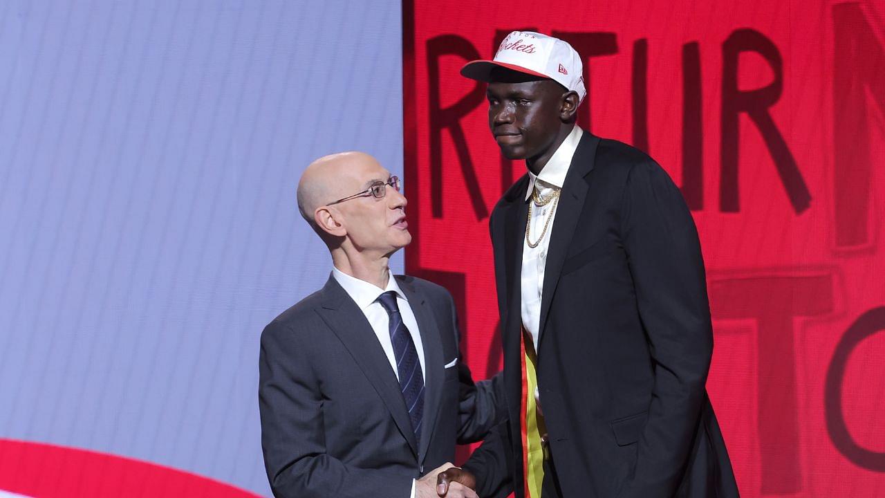 Khaman Maluach stands with NBA commissioner Adam Silver after being selected as the tenth pick by the Houston Rockets in the first round of the 2025 NBA Draft at Barclays Center