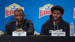 Colorado Buffaloes head coach Deion Sanders and quarterback Shedeur Sanders (2) talk with the media after the game against the Brigham Young Cougars at Alamodome.