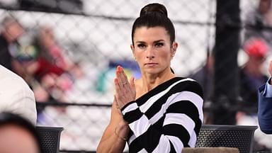 Former professional racing driver Danica Patrick looks on before the 109th Running of the Indianapolis 500 at Indianapolis Motor Speedway.