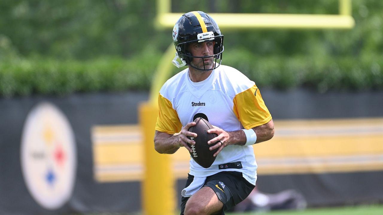 Pittsburgh Steelers quarterback Aaron Rodgers (8) drops back to pass during minicamp at their South Side facility.