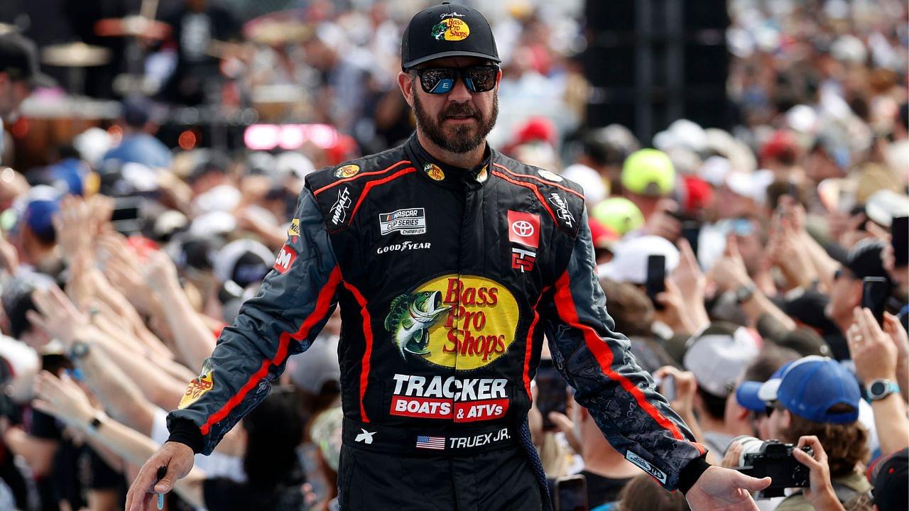 NASCAR Cup Series driver Martin Truex Jr. (56) walks onto the driver introduction stage to greet fans before the Daytona 500 at Daytona International Speedway.