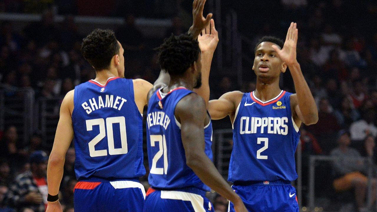 Los Angeles Clippers guard Landry Shamet (20) guard Patrick Beverley (21) and guard Shai Gilgeous-Alexander (2) react against the Memphis Grizzlies during the first half at Staples Center
