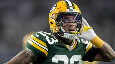 Green Bay Packers cornerback Jaire Alexander (23) reacts after intercepting a pass during the first quarter of the wild card playoff game against the Dallas Cowboys Sunday, January 14, 2024 at AT&T Stadium in Arlington, Texas.