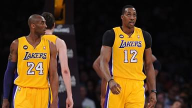 Mar 22, 2013; Los Angeles, CA, USA; Los Angeles Lakers shooting guard Kobe Bryant (24) and center Dwight Howard (12) in the first half of the game against the Washington Wizards at the Staples Center.