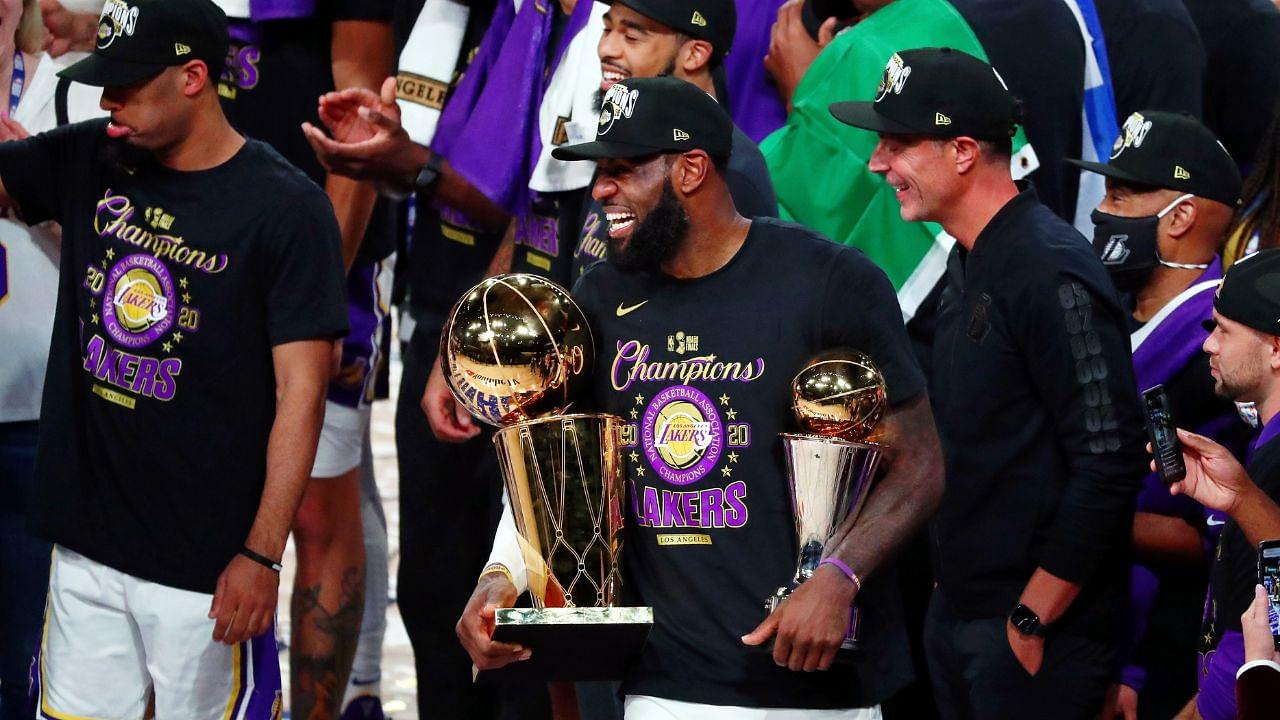 Los Angeles Lakers forward LeBron James (23) smiles while holding the MVP and Finals trophies after game six of the 2020 NBA Finals at AdventHealth Arena. The Los Angeles Lakers won 106-93 to win the series.