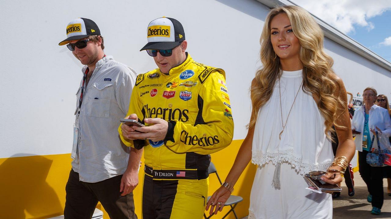 NASCAR Sprint Cup Series driver Ty Dillon (center) with girlfriend Haley Carey before the Daytona 500 at Daytona International Speedway.