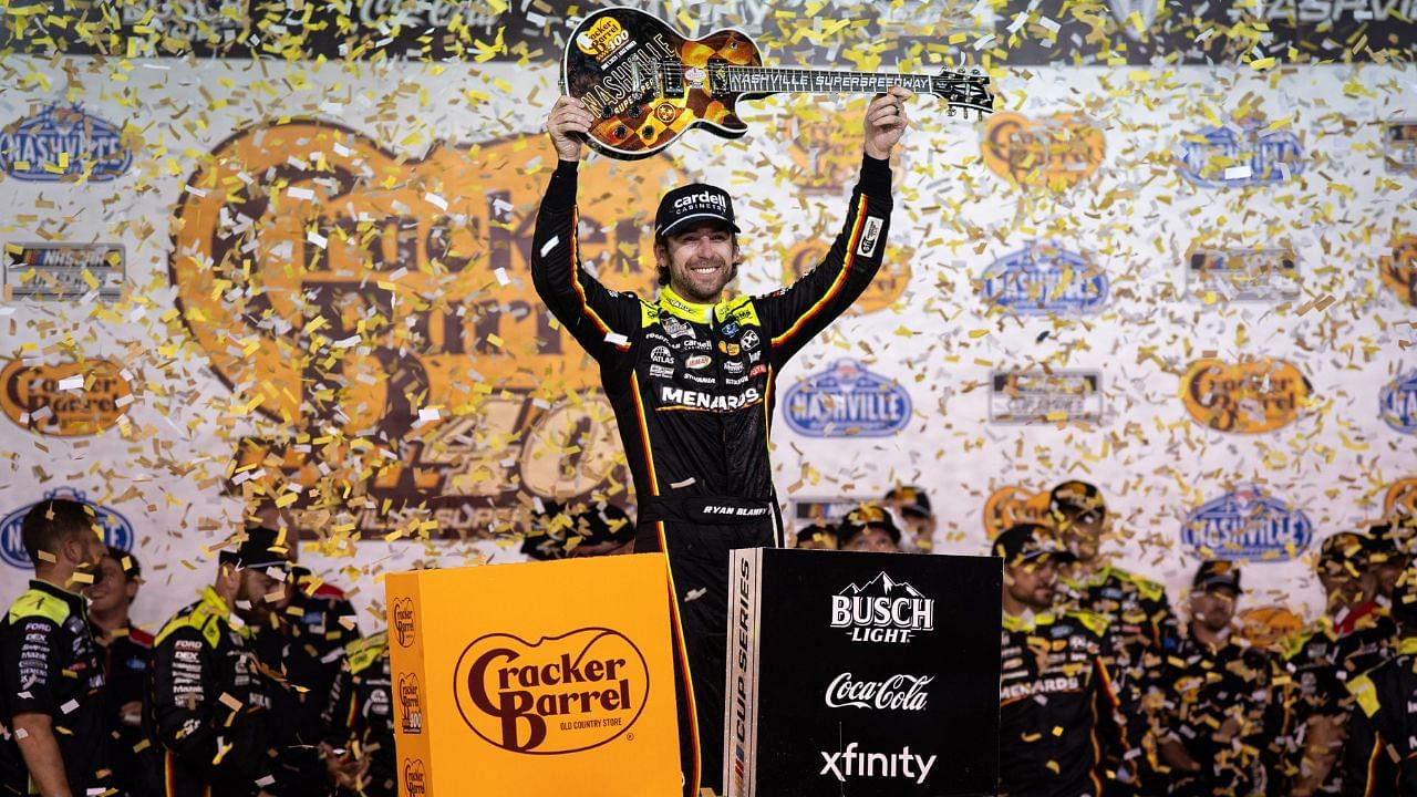NASCAR Cup Series driver Ryan Blaney celebrates winning the Cracker Barrel 400 at Nashville Superspeedway in Lebanon, Tenn.